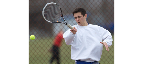 Parker Tuthill brought Mattituck one of its three wins at singles, defeating Shoreham-Wading River's Brandon Porcele in two sets. (Credit: Garret Meade)