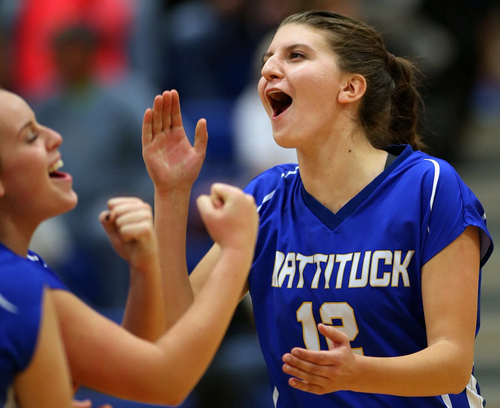 Mattituck's Carly Doorhy, left, and Skyler Grathwohl rejoice following their team's county semfiinal win over Greenport/Southold. (Credit: Garret Meade)