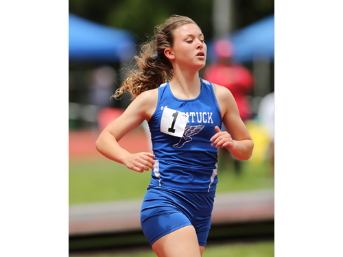 Melanie Pfennig of Mattituck competed in the 1500 meter run. The Section XI  Boys and Girls Track Championship / State Qualifier meet was held at Port Jefferson HS on May 31st 2014. Daniel De Mato