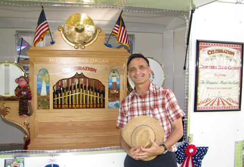 TIM GANNON PHOTO | Michael Sarlo and his organ, Celebration, at the Greenport Carousel in Mitchell Park Saturday.
