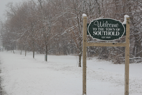 JENNIFER GUSTAVSON FILE PHOTO | A snowy Southold Town sign on Main Road in Mattituck.
