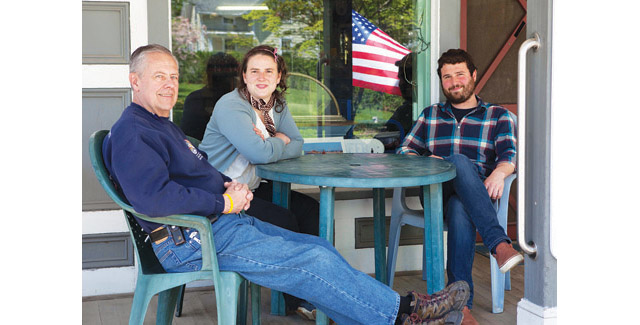 KATHARINE SCHROEDER PHOTO | Orient Country Store's former owner Linton Duell, left, with new owners Miriam Foster and Grayson Murphy on Thursday.