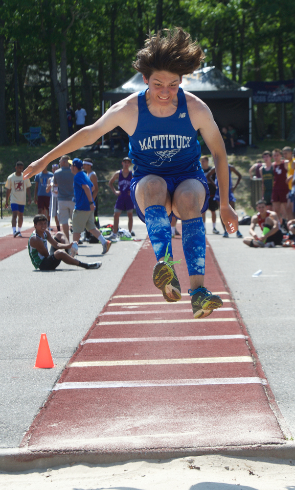 Jack Dufton competes in the long jump of the pentathlon. 