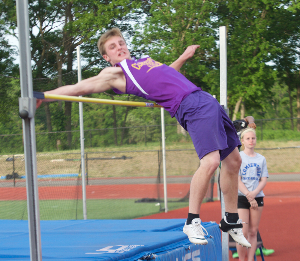Benjamin Bracken competes in the high jump.