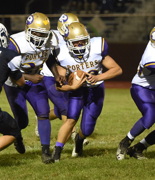 Late in the game, junior QB Dylan Marlborough gets some yardage on a quarterback keeper. (Credit: Robert O'Rourk)