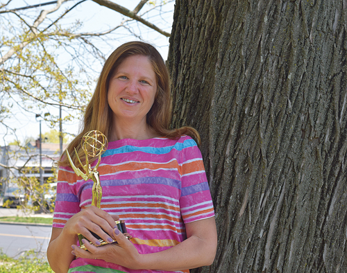 Freelance photographer and videographer Randee Daddona with the Emmy award she received Saturday. (Credit: Vera Chinese)