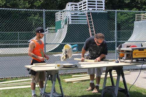 Volunteers help make upgrades to the Greenport Skate Park on Moores Lane Tuesday afternoon. (Cyndi Murray photo) 
