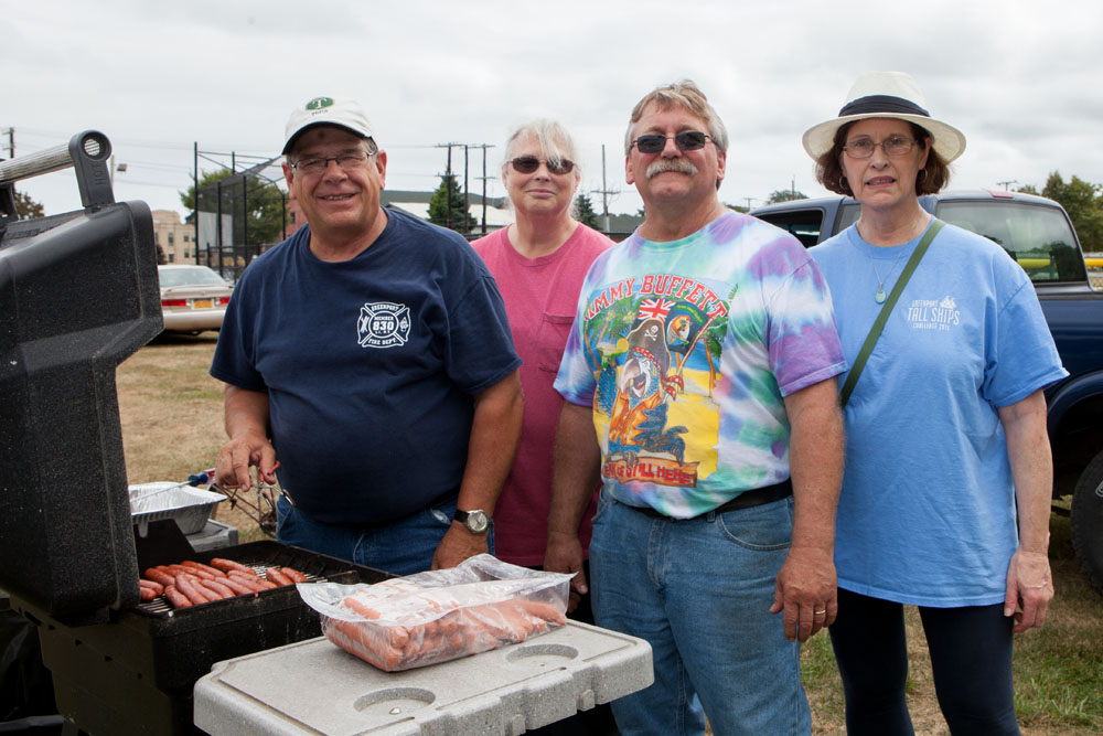 Pete Harris, Mary Bess Phillips, Mayor George Hubbard and Julia Robins help out on the grill.