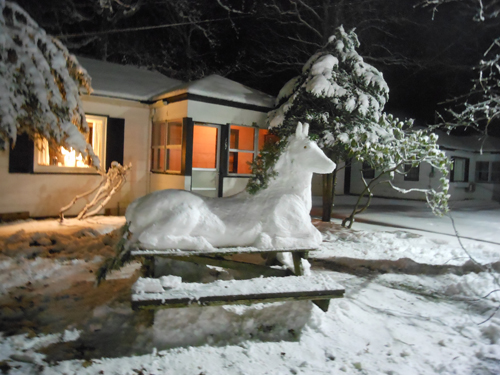 Guests at the Silver Sands Motel in Greenport made a snow horse on top of a picnic table (Photo by Terry Keefe).