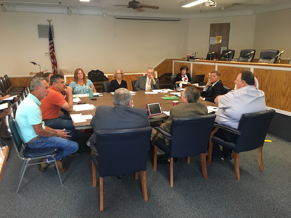 Southold Town Board members at Tuesday's meeting. A search is currently underway to hire a new town attorney. (Credit: Jen Nuzzo)