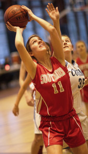 GARRET MEADE PHOTO | Southold's Nicole Busso, looking for shooting room with Kendall Scala of The Ross School trying to block her shot, put in 12 points.