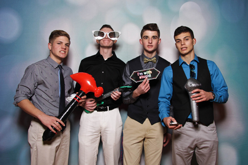 From left, Southold High School treasurer Zach Elillis, vice president Thomas Messana, secretary Jack Dunne, and president Christopher Buono in a photo booth picture taken at a semi-formal dance that included seniors from neighboring districts.