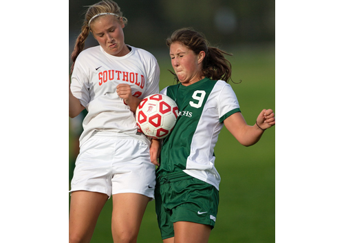 Southold/Greenport's Jill Golden and Bishop McGann-Mercy's Alexandra Hulse competing for the ball during Monday's 2-2 draw. (Credit: Garret Meade)