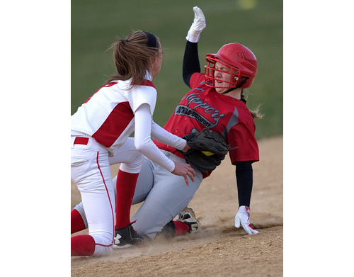 Center Moriches' Cassy Smith tags out Southold/Greenport's Heather Jarvis, who tried to steal second base in the fifth inning. (Credit: Garret Meade)