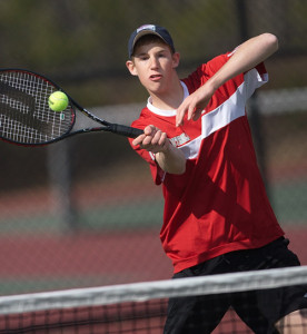 GARRET MEADE PHOTO | Gary Prieto of Southold/Greenport playing at the net during his second singles match against Caleb Reed of Hampton Bays.
