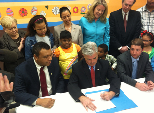 Steve Bellone signs the new tobacco law in October, raising the age limit to 21 for tobacco purchases. (Credit: Courtesy)