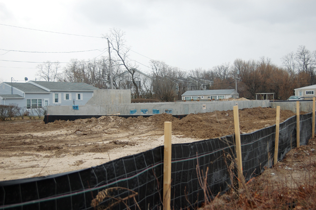 Earlier this year developer Nick Paleos of Nickart Realty Corp. in Baldwin said two homes going up along Route 48 near Town Beach in Southold would be finished by July. (Credit: Cyndi Murray, file)