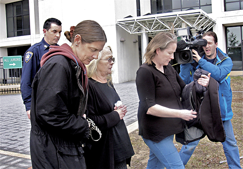 As she left court, Ms. Stulsky was hounded by regional reporters, who demanded to know why she stole the funds. (Credit: Barbaraellen Koch)