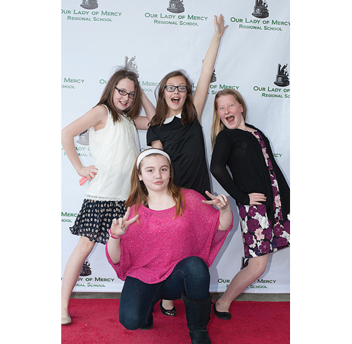 Our Lady of Mercy sixth-graders (from left) Lilly Kneidl, Katie Bohner, Molly Tuthill and Haylie Tierney. (Credit: David Benthal)