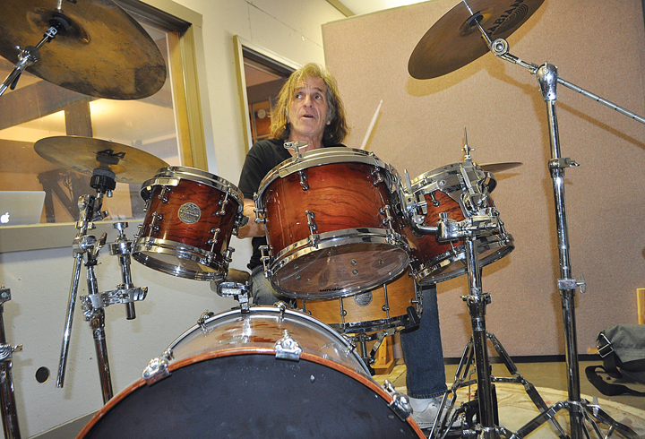 Corky Laing of Greenport rehearses earlier this month at his Southold studio. (Credit: Rachel Young)