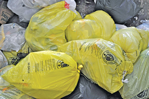 The town recently published an updated brochure on its yellow bag program. (Tim Kelly file photo) 