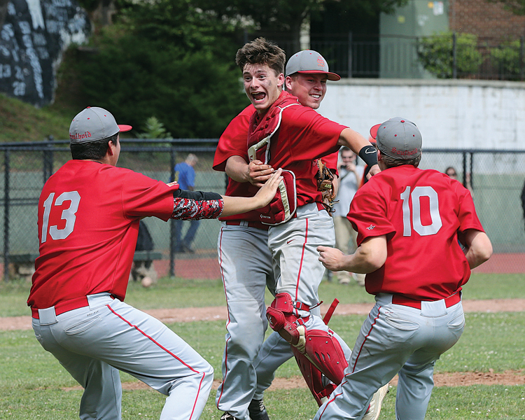 The celebration begins for Southold last year after defeating Tuckahoe in the Class C Baseball Regional Championship game. (Credit: Daniel De Mato)