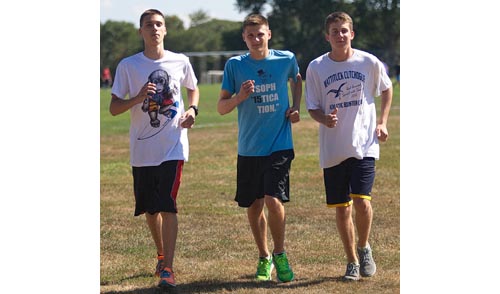 From left, Jeremy Rempe, Jon Rempe and Owen Klipstein are among the leading runners for a Southold team that is making a run at county and league titles. (Credit: Garret Meade)