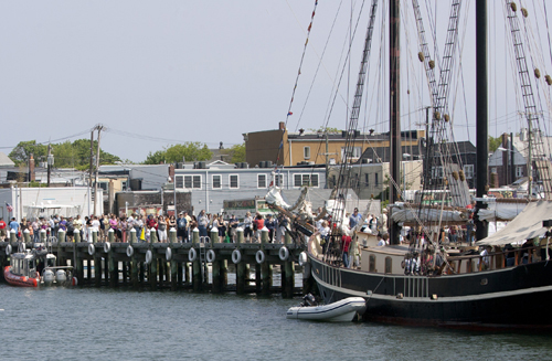 KATHARINE SCHROEDER FILE PHOTO | A long line to board one of the ships at this year's Tall Ships of America event.