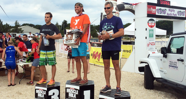 Tim Steiskal, center, won in his first bid at the Mighty North Fork Triathlon Sunday. Adrian Mackay, right and Mike Merlo placed second and third, respectively. (Credit: Grant Parpan)