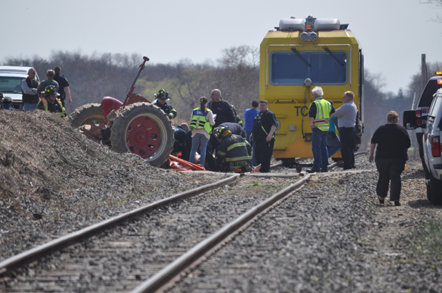 First responders on scene of the accident in Laurel Tuesday afternoon after a train collided with a tractor. (Credit: Grant Parpan)