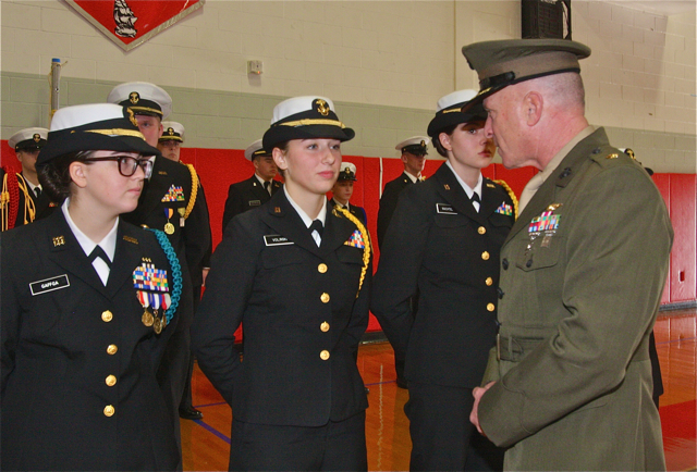 Southold-Mattituck-Greenport Navy Junior Reserve Officer Training Corps senior instructor Major William Grigonis talks to some of the cadets after the inspection.