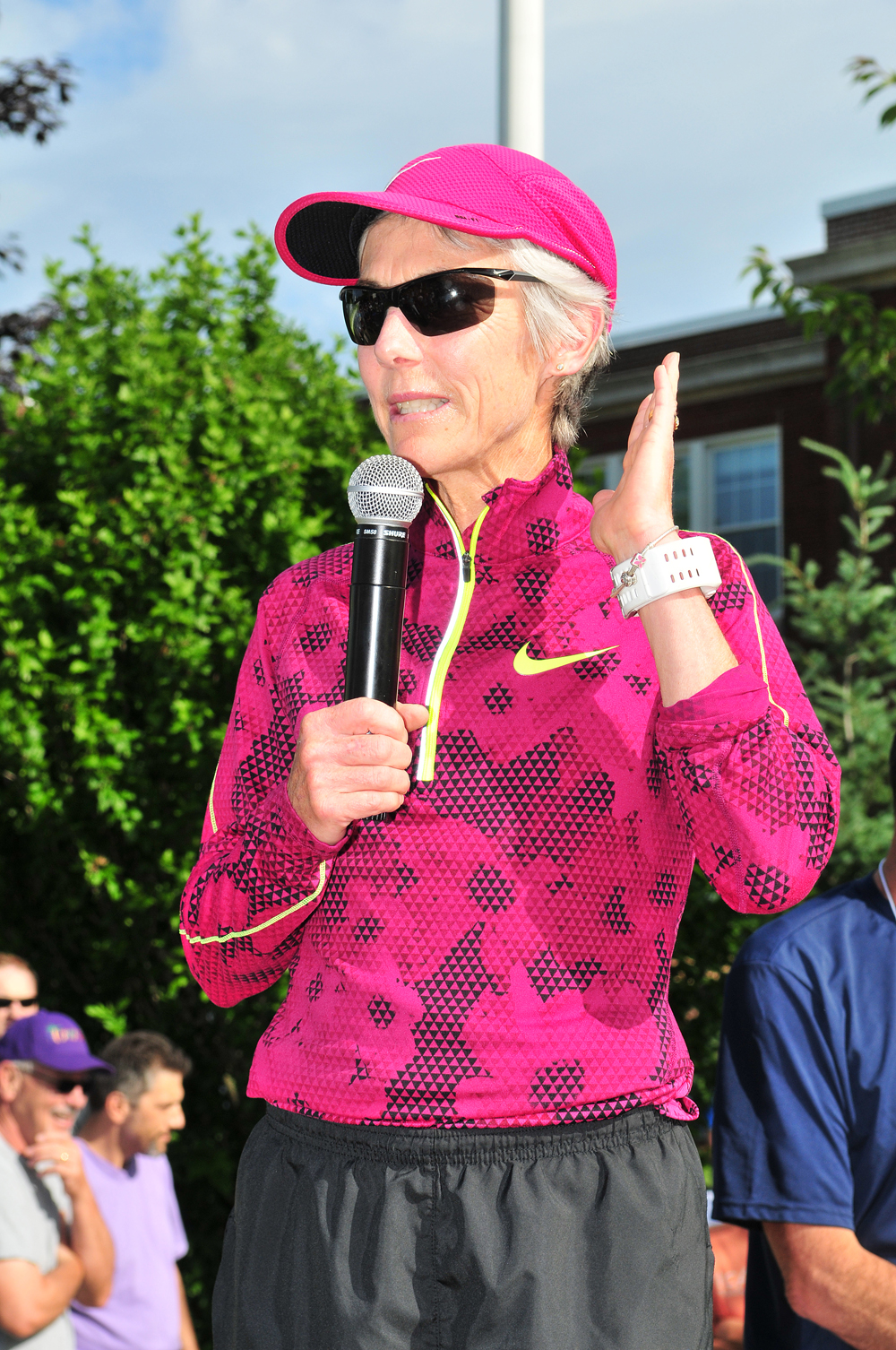 Olympic gold medal winner Joan Benoit Samuelson addresses the crowd before the start of the race. (Credit: Bill Landon)