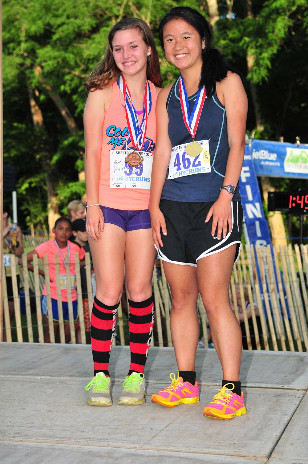 Second place finisher Michelle Fennig of Cutchogue and 19U winner Lauren Dorsky of Huntington. (Credit: Bill Landon)