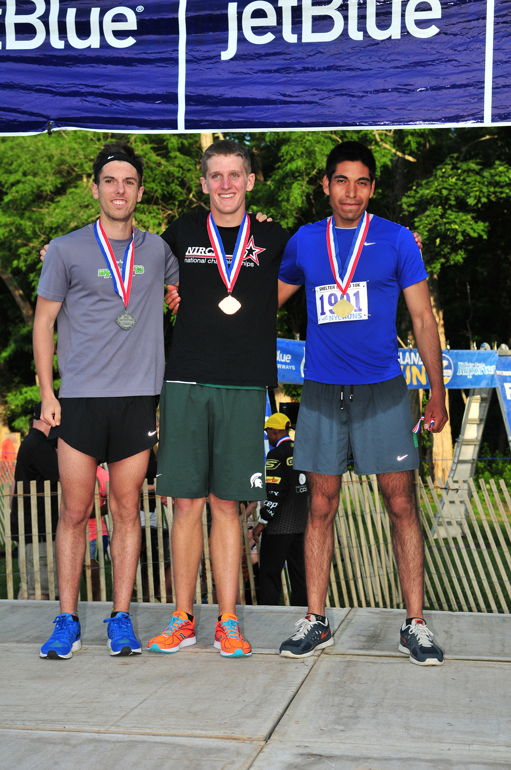 Second place Timothy Rossi of New York(left to right), Blane Bossung of East Quogue and male 20-24 winner Luis Ramirez. (Credit: Bill Landon)