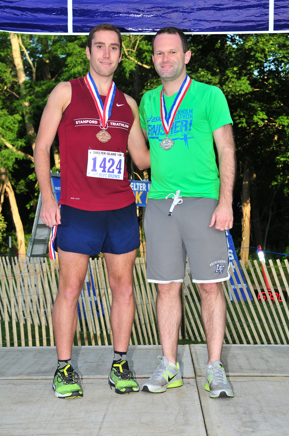 Ian Stearns (left) finished third among males 25 to 29, a division won by Daniel Widlowski of Sag Harbor.