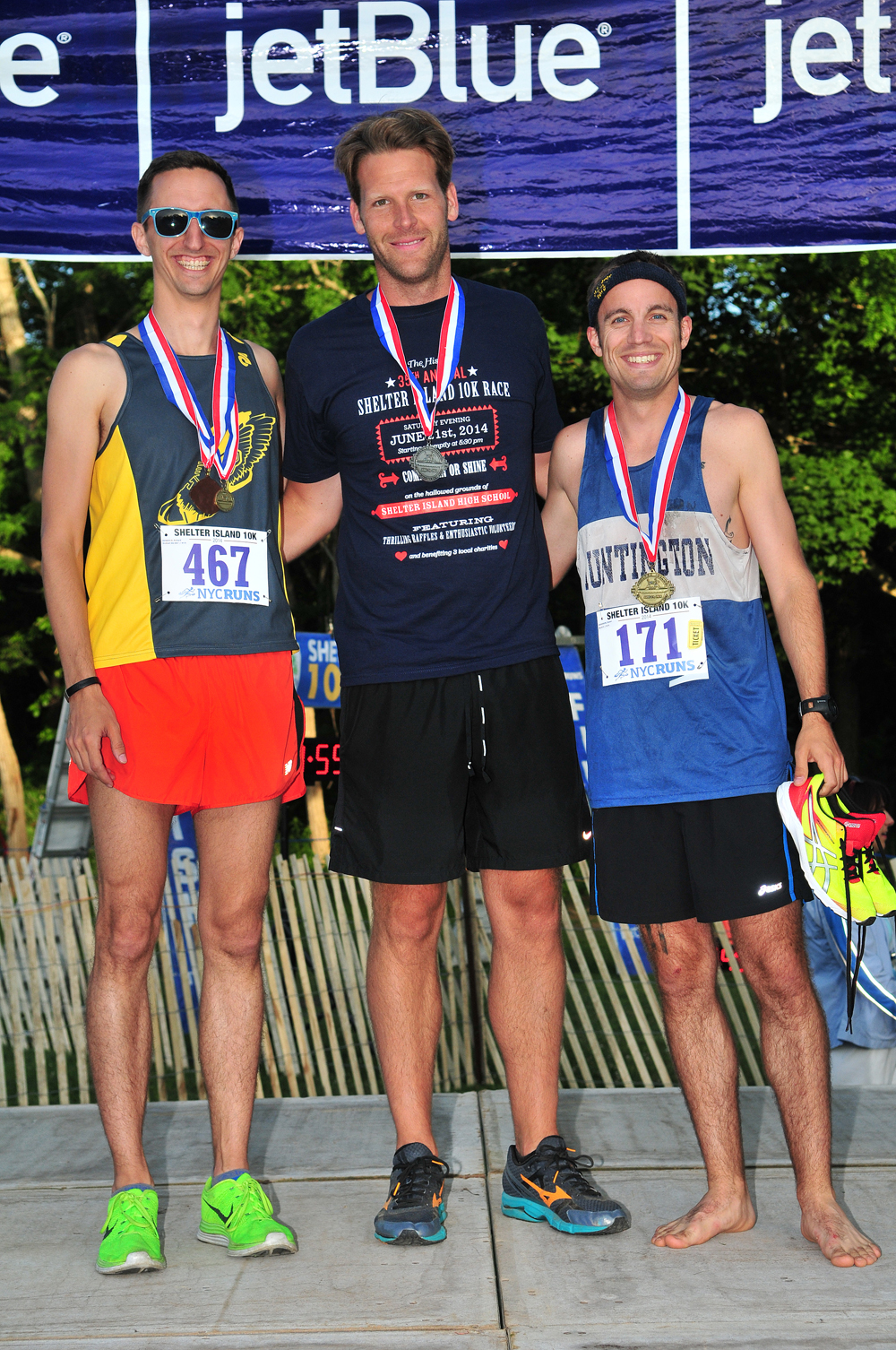 Richard Dower of Brooklyn (from left to right) was third place in the male 30-34 age group, following Gregory Thayer of Gorham, Maine and Shawn Anderson of Huntington Station. (Credit: Bill Landon)