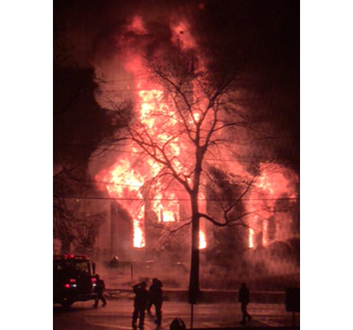 First Universilist Church in Southold in flames Saturday night. (Credit: Kathryn Zukowski)