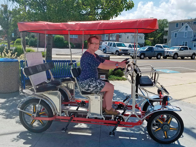 Johanna Benthal of Jamesport on a Surrey bike in Cape May, N.J. Her family hopes to purchase one like it with funds raised at the Oct. 1 yard sale sponsored by Kait's Angels. (Credit: Courtesy)