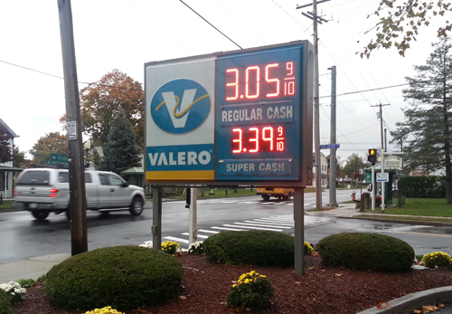 The Valero sign in Jamesport reflecting the cash price of $3.05 per gallon of regular gasoline Thursday afternoon. (Credit: Jen Nuzzo)
