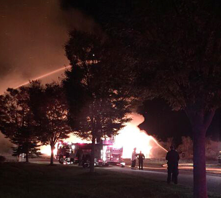 Fire crews on scene early Monday morning of a house fire in Mattituck. (Credit: Cindy Suozzi, courtesy)