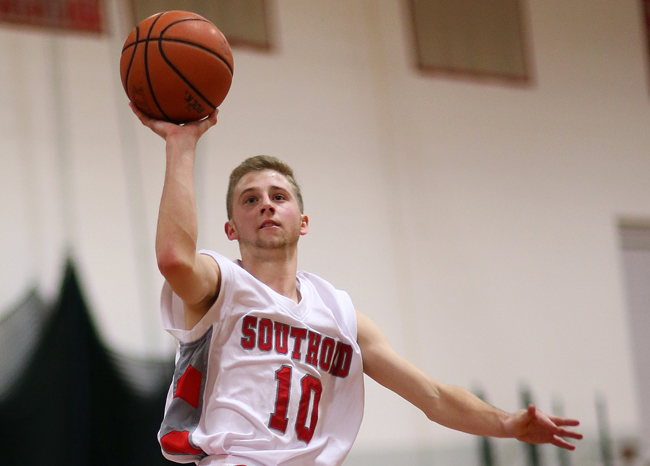 Southold guard Shayne Johnson goes up for a one-handed shot earlier this season. (Credit: Garret Meade, file)