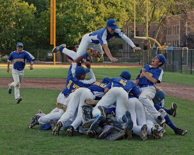 After a wild 10-inning win Saturday, the Mattituck baseball team celebrated in style. Mattituck advances to the state semifinals next weekend. (Credit: Daniel De Mato) 
