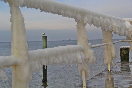 The ice covered rails at Iron Pier Beach in Northville are starting to melt. (Carrie Miller Photo) 