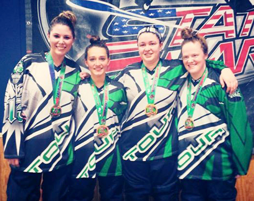 Sarah Sinning of Peconic, second from left, pictured after helping lead her roller hockey team, Tour Roadrunners to a tournament win in Detroit last April. (Courtesy photo)