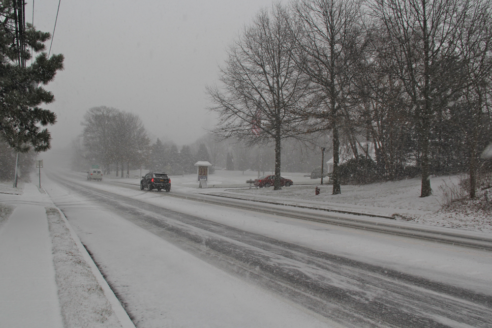 Snow blankets the Main Road in Mattituck. (Credit: Carrie Miller)