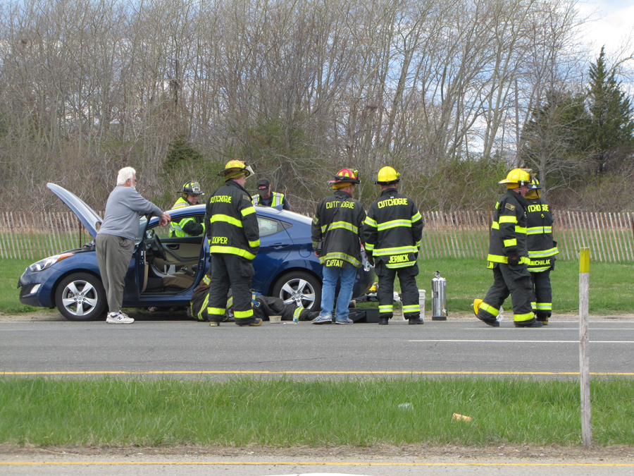 Firefighters expect the car that was leaking fluid on the road just west of Cox Lane on Route 48. (Credit: Tim Gannon)