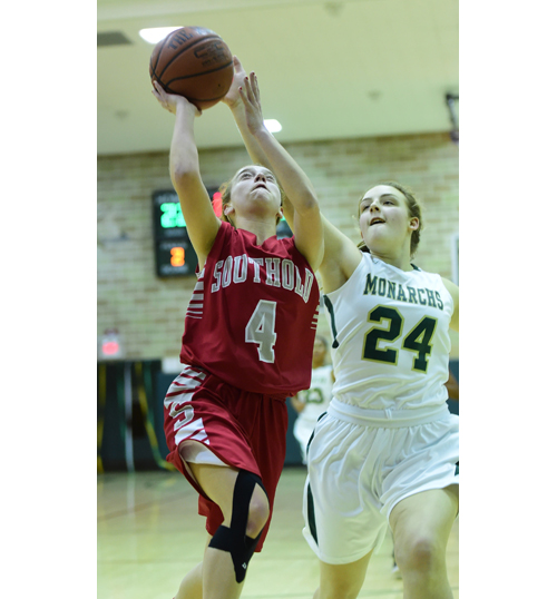 Southold sophomore Madison Tabor goes up for a shot as Mercy's Nicole Gravagna guards. (Credit: Robert O'Rourk)