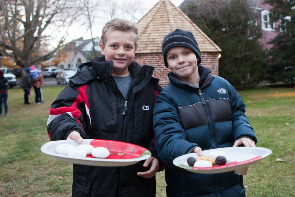 Nine-year-olds Brandon Cole, left, and Matthew Goldberg, both of Merrick, offer to share donuts.